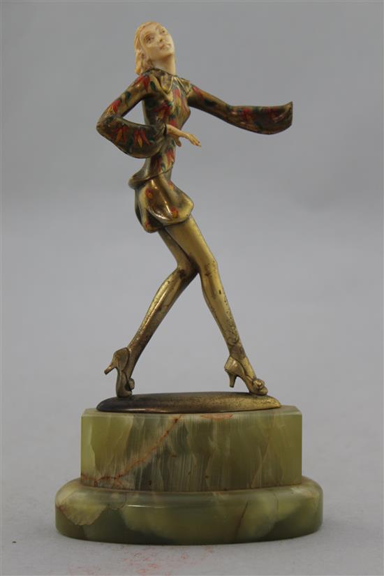 Attributed to Josef Lorenzl. An Art Deco cold painted bronze and ivory figure of a dancer, 8in.